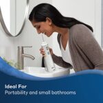 Waterpik Cordless Pearl Rechargeable Portable Water Flosser for Teeth, Gums, Braces Care and Travel with 4 Flossing Tips, ADA Accepted, Charger May Vary, WF-13 White